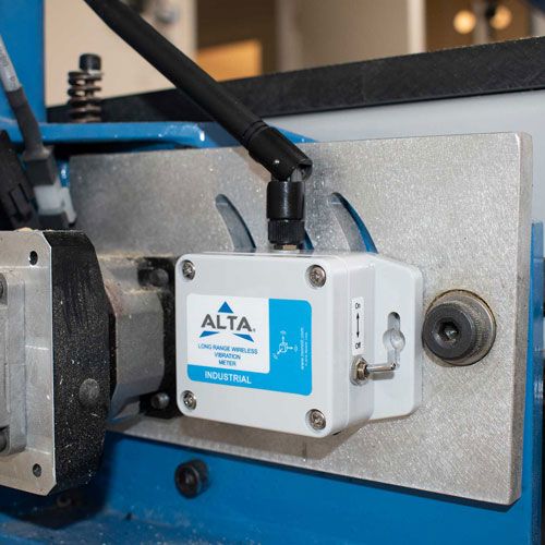 Industrial wireless vibration meter in use